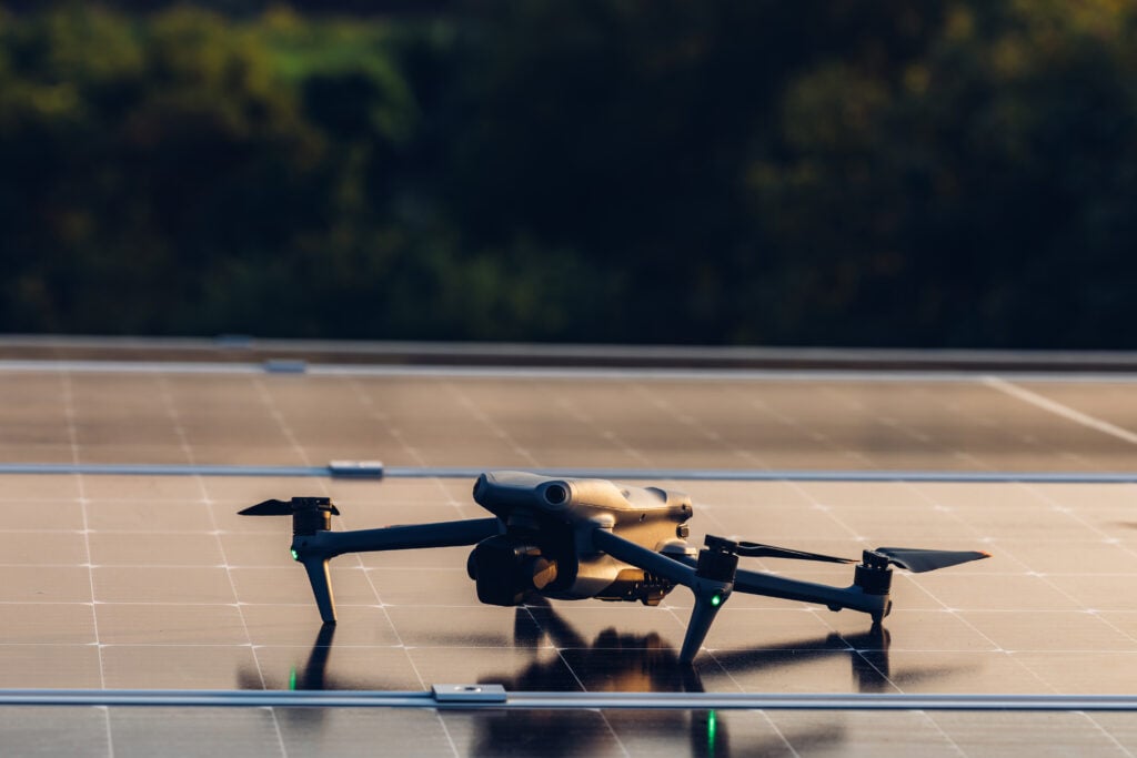 Drone inspects damage on solar panel